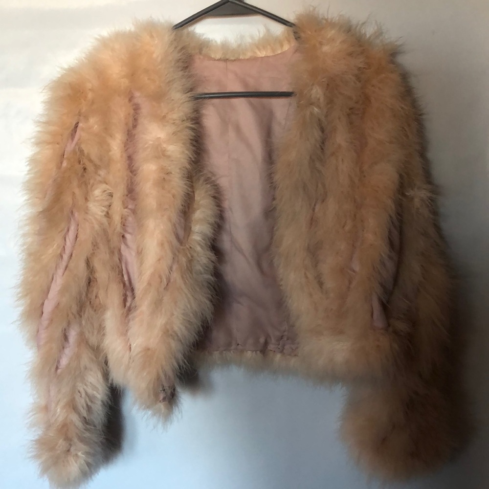 Vintage 1960’s baby pink ostrich fur jacket